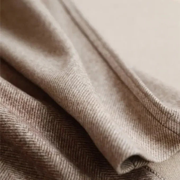 Close-up of beige fabric with a subtle pattern