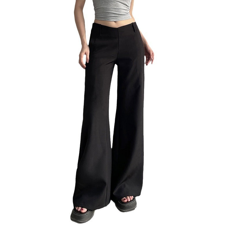 Black wide-leg pants worn by a person on a white background