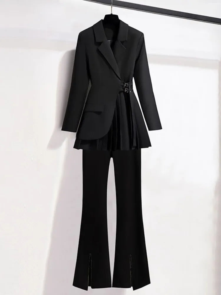 Black suit with a blazer and pants on a white background