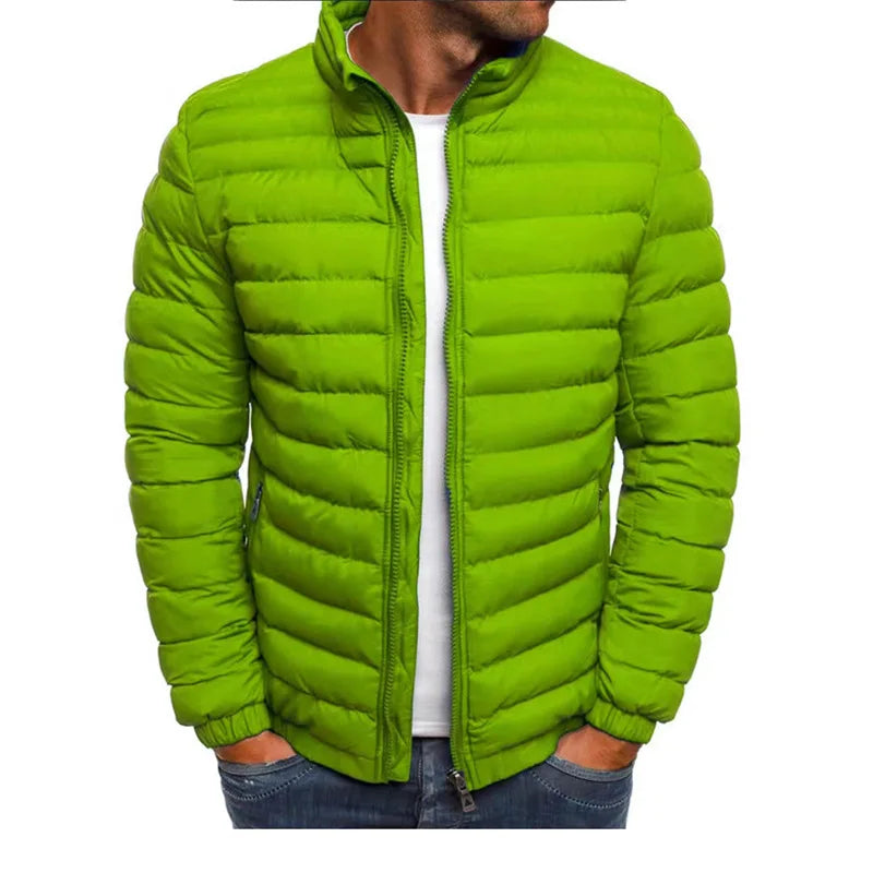 Green puffer jacket worn by a person on a white background