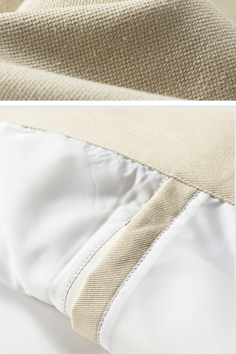 Close-up of beige and white fabric with a textured pattern