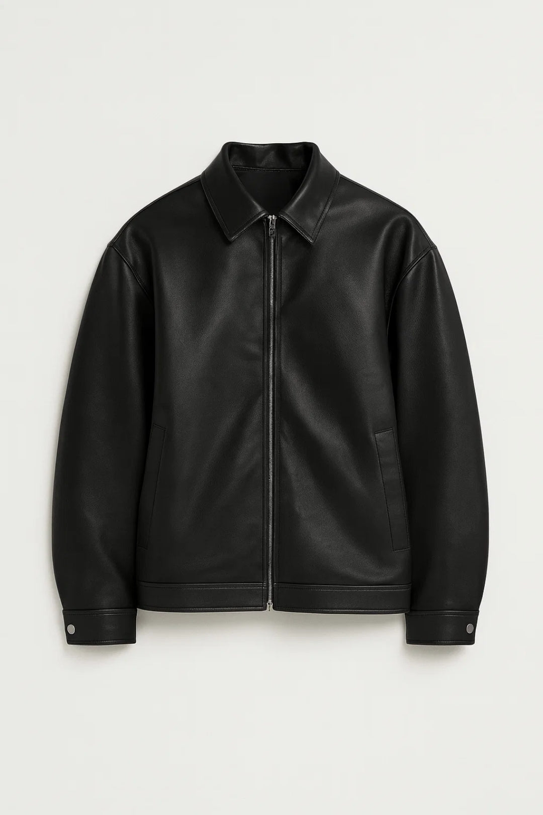 Black leather jacket on a light gray background