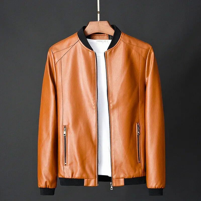 Brown leather jacket on a hanger against a dark background