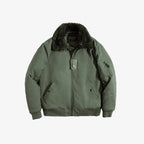 Green jacket with fur collar on a white background