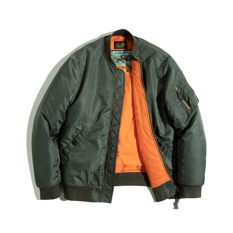 Green bomber jacket with orange lining on a white background