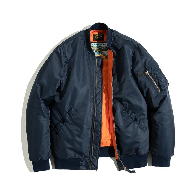 Navy bomber jacket with orange lining on a white background