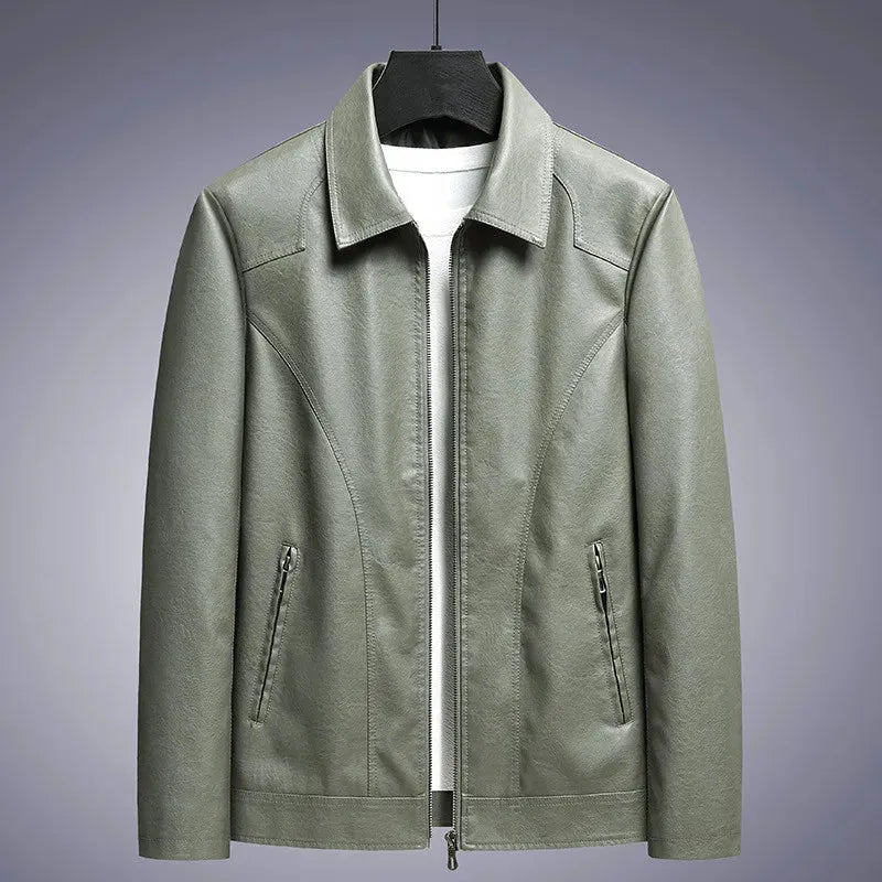 Green leather jacket on a gray background