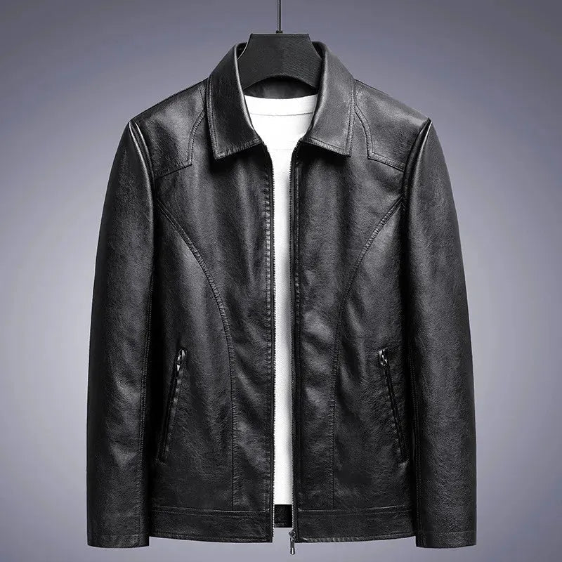 Black leather jacket on a gray background