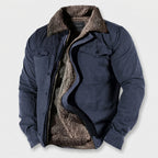 Blue jacket with brown sherpa lining on a white background