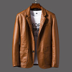 Brown leather jacket on a hanger with a gray background
