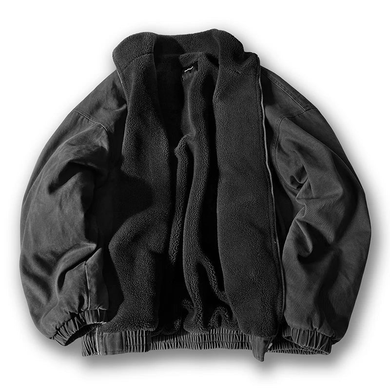 Black fleece jacket on a white background
