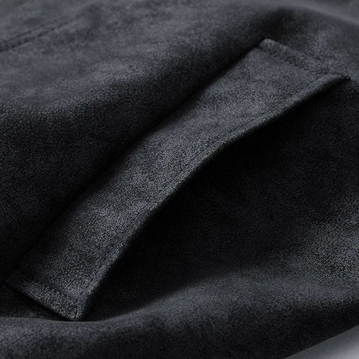 Close-up of dark gray fabric with a textured surface