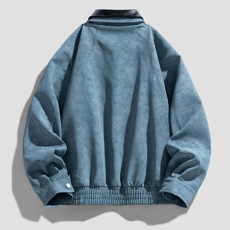 Blue jacket on a light gray background