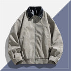 Gray jacket with black collar on a light gray background