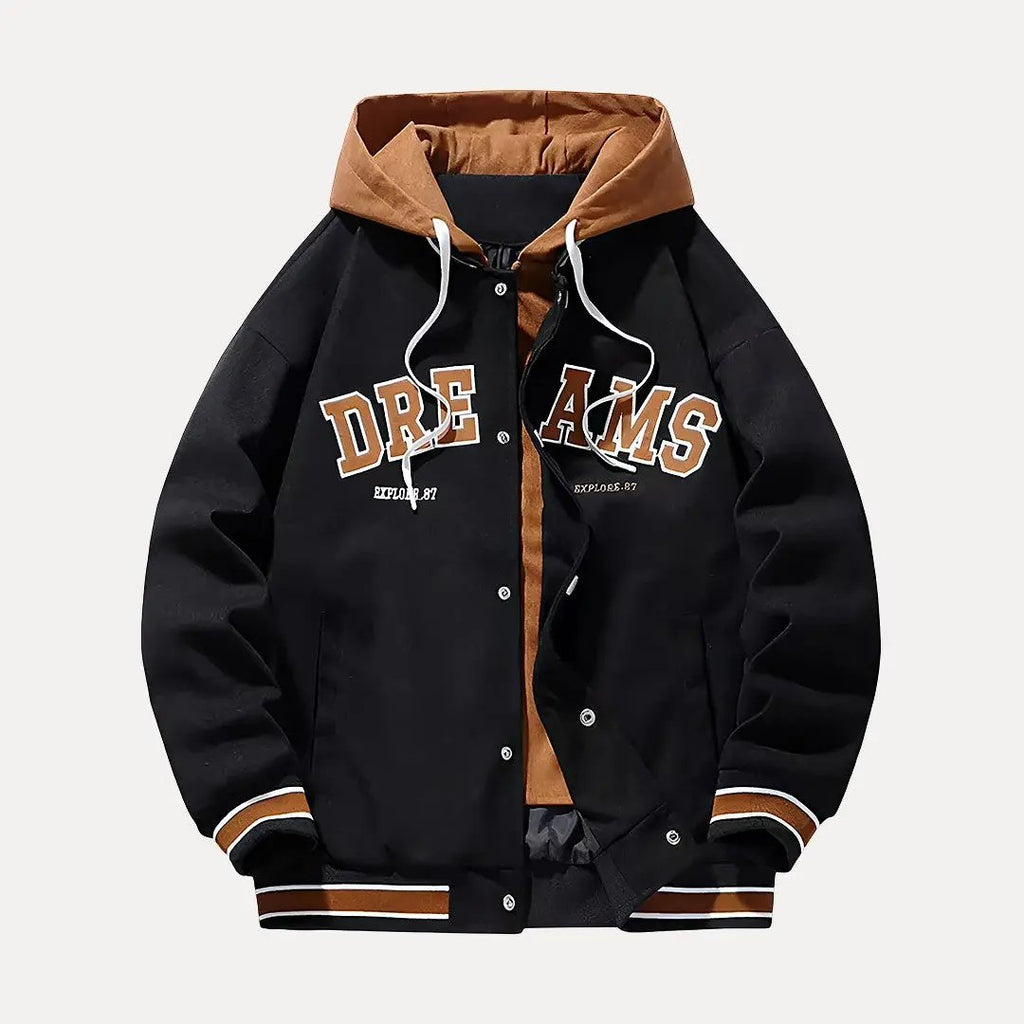 Black and brown varsity jacket with 'DREAMS' text on a white background