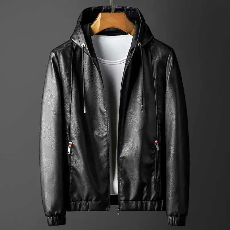 Black leather jacket on a hanger against a gray background