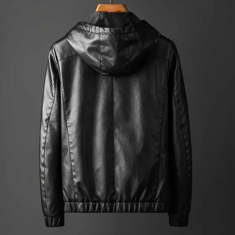 Black leather jacket on a gray background