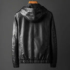 Black leather jacket on a gray background
