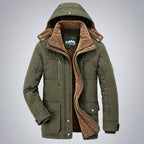 Green winter jacket with brown fur lining on a gray background