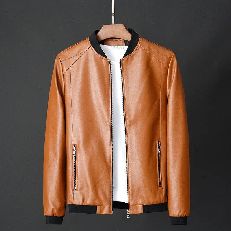 Brown leather jacket on a hanger against a dark background
