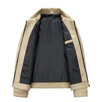 Beige and black jacket with a white background