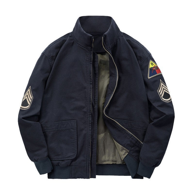 Navy blue jacket with patches on a white background