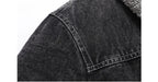 Close-up of a black denim jacket with stitching detail on a white background