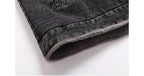 Close-up of a gray denim jacket with fleece lining on a white background