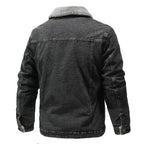Black denim jacket with gray fur collar on a white background