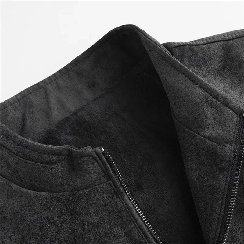 Close-up of a black jacket with a zipper on a white background