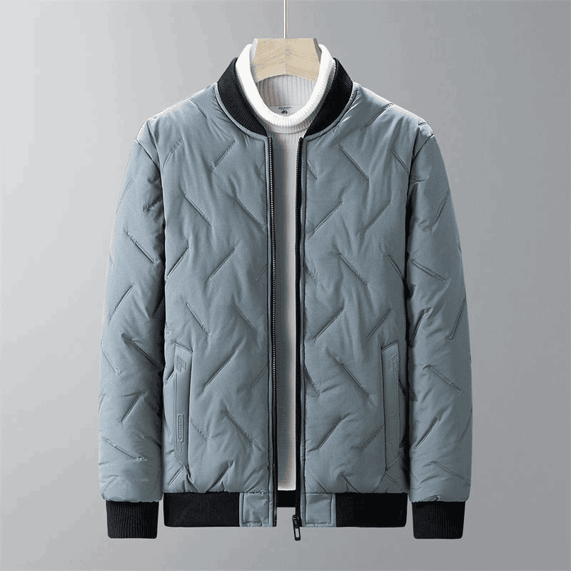 Light blue quilted jacket with black accents on a gray background