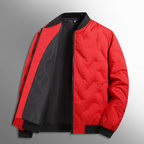 Red and black quilted jacket on a gray background