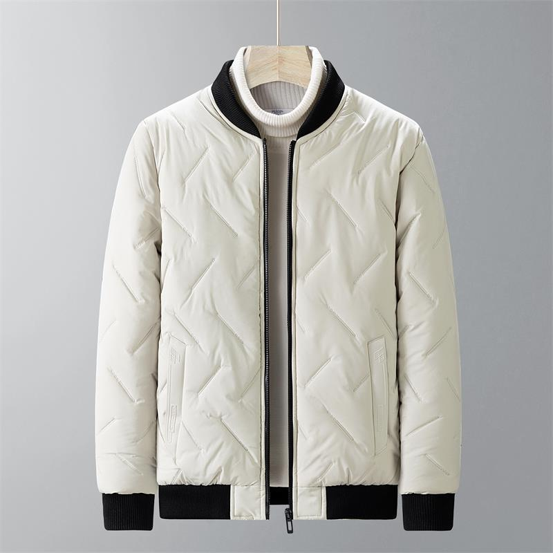White quilted jacket with black accents on a gray background