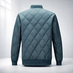 Quilted jacket with diamond pattern on a light gray background