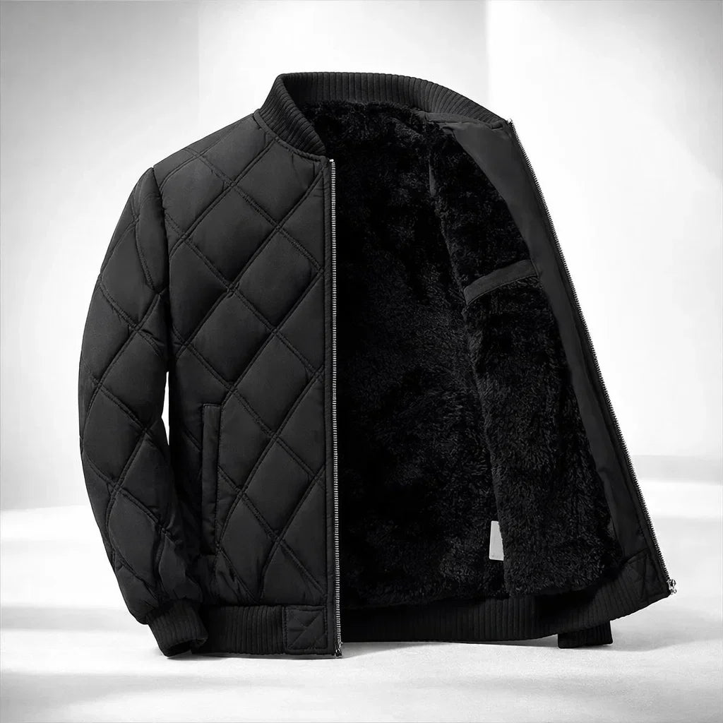 Black quilted jacket with shearling lining on a white background