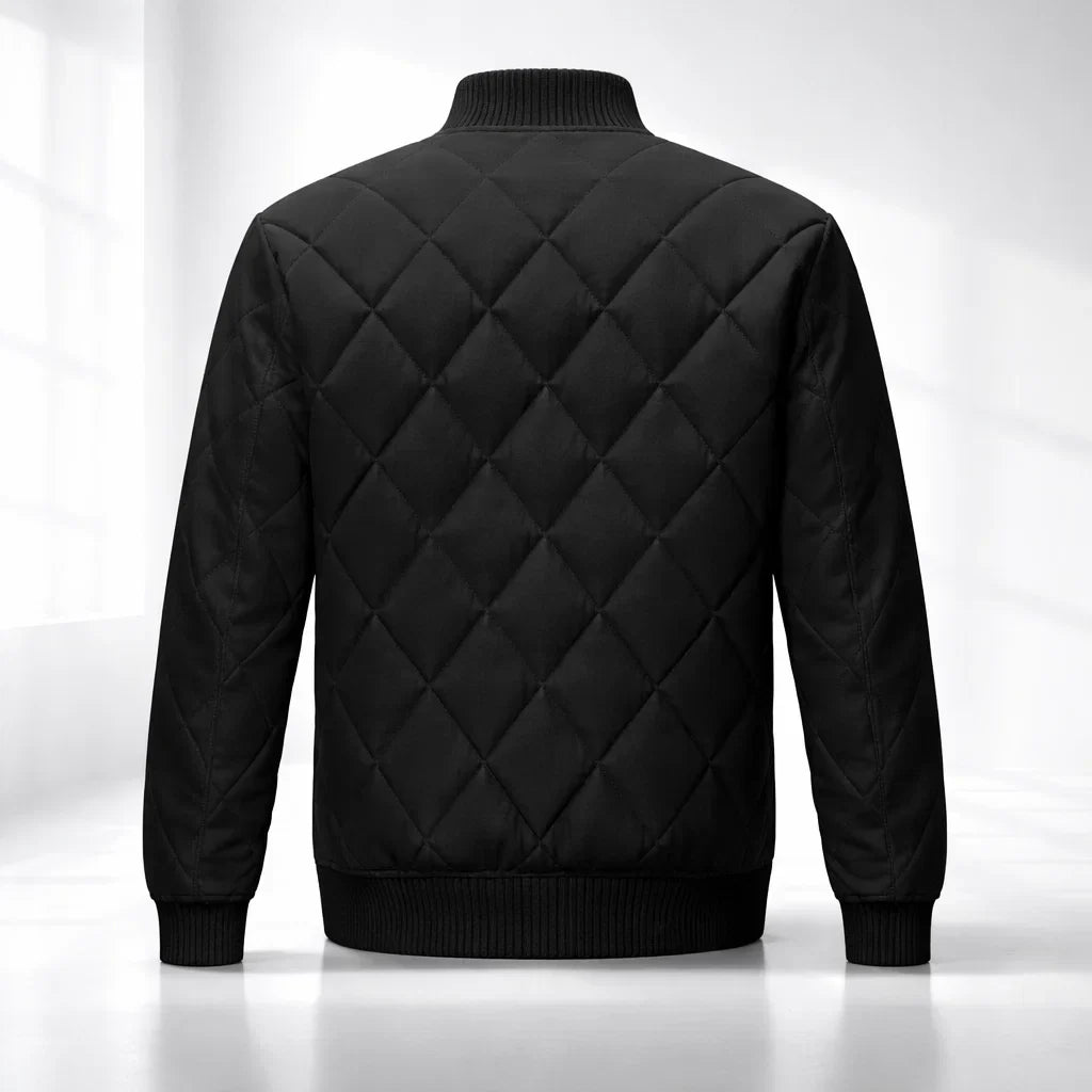 Black quilted jacket on a white background