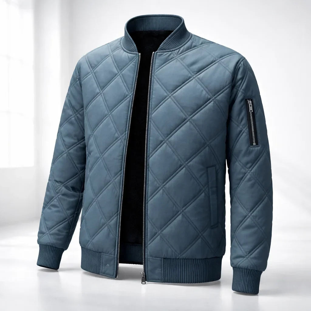 Blue quilted jacket on a white background