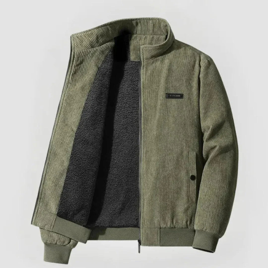 Green corduroy jacket with a brand logo on a light gray background