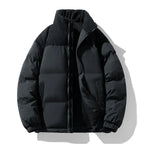 Black puffer jacket on a white background