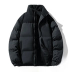 Black puffer jacket on a white background
