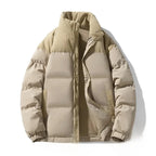 Beige puffer jacket on a white background
