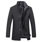 Dark gray coat with buttons on a white background
