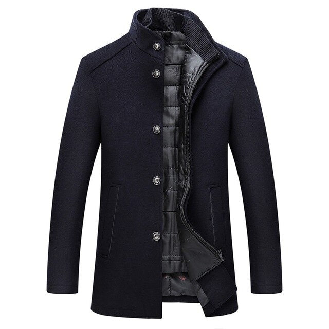 A men's dark navy blue wool-blend coat with a high ribbed collar, button front, and an open front showing a black quilted lining, displayed on a clean white background.