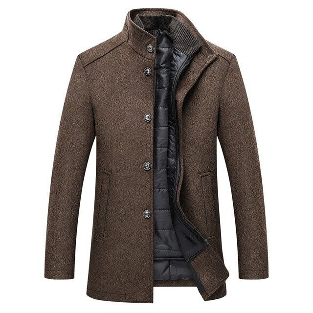 A men's brown textured wool-blend coat with a high stand collar, black quilted lining, and silver-tone snap buttons, shown open on a plain white background.