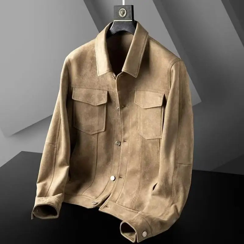 Brown suede jacket on a black hanger against a gray geometric background