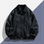 Black jacket with a high collar on a two-tone blue and white background