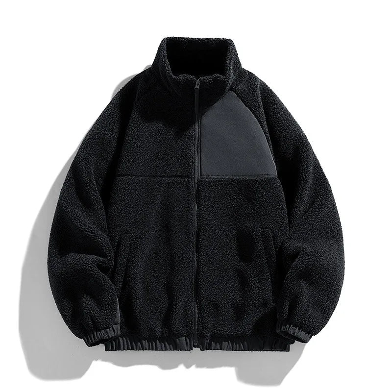 Black fleece jacket with The North Face logo on a white background