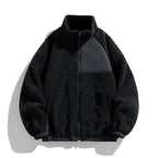 Black fleece jacket with The North Face logo on a white background