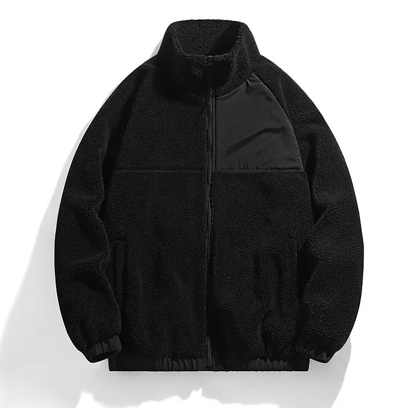 Black fleece jacket on a white background