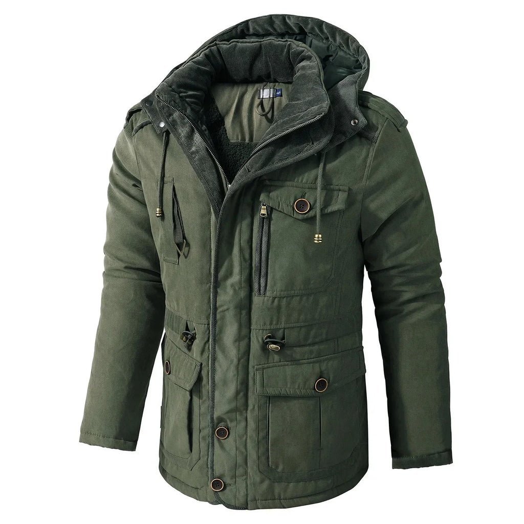 Green winter jacket with a hood on a light gray background